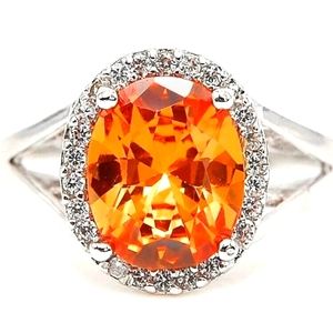 Gorgeous padparasha sapphire and white topaz ring